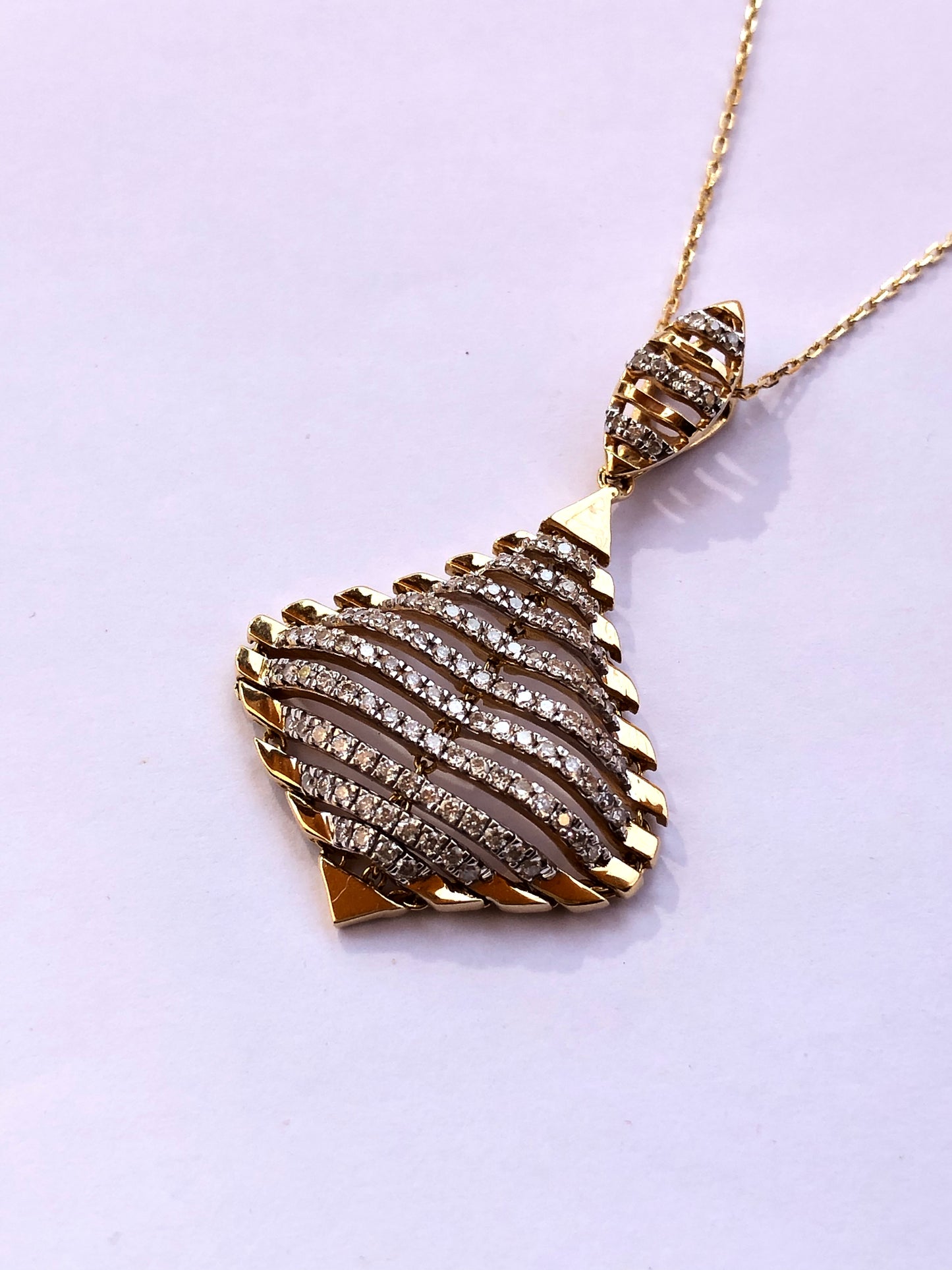 18kt Gold & Diamond pendant by Damas UAE.