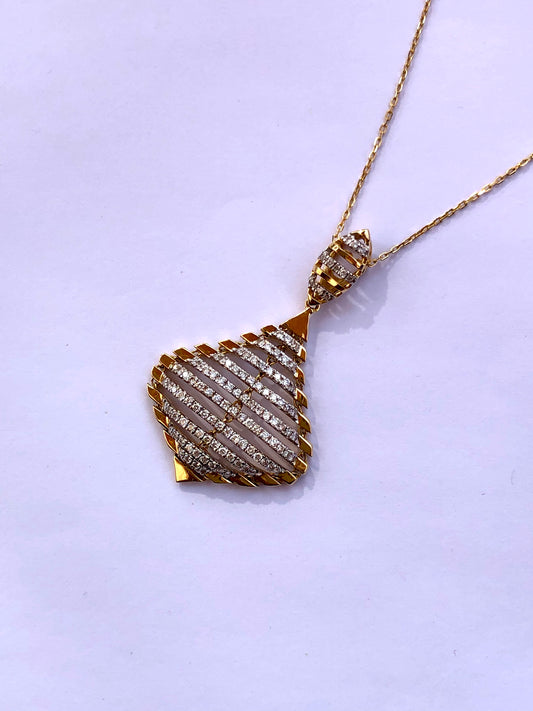 18kt Gold & Diamond pendant by Damas UAE.